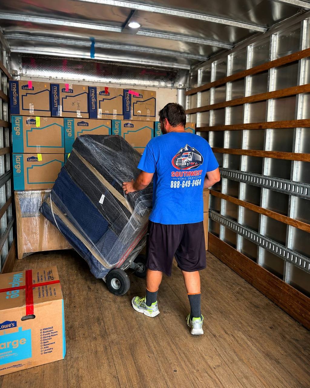 Household furniture wrapped and protected for a long-distance move